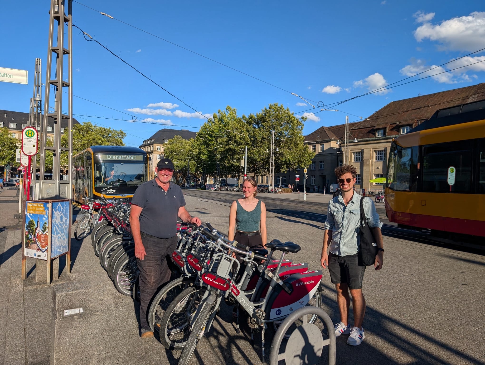 KIT team members with KVV nextbike bike-share cycles and public transport in Karlsruhe